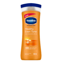 A bottle of Vaseline Healthy Even Tone Lotion with Vitamin B3 and SPF 10, showcasing its packaging and product details.