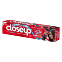 A close-up view of a tube of toothpaste with a toothbrush, highlighting the toothpaste being squeezed onto the brush.